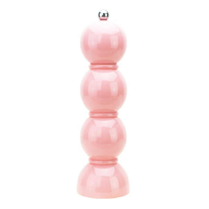 A pink lacquered bobbin mill with a chic silhouette, crafted from solid wood with a high-gloss finish.