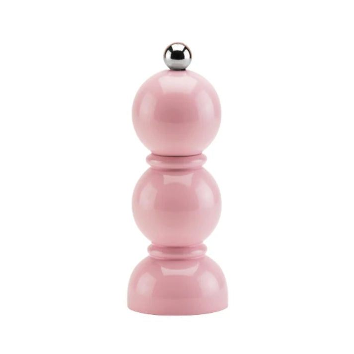 A pink bobbin-shaped salt or pepper mill with a silver top knob.
