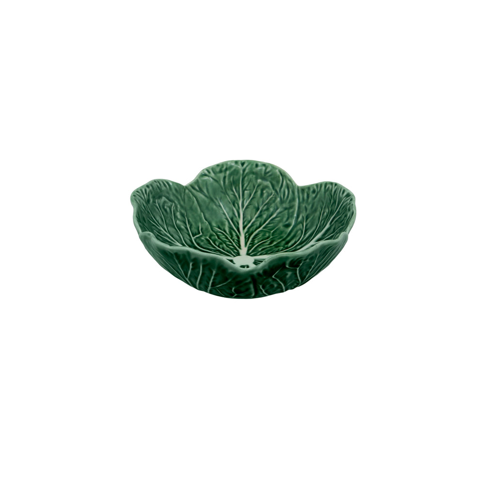 A large, green, earthenware bowl with a leaf-like design, part of the Bordallo Pinheiro Cabbage Collection.
