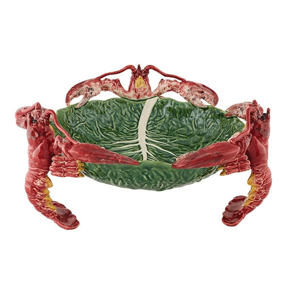 A colorful ceramic centerpiece in the shape of a cabbage leaf with lobsters, part of the Bordallo Pinheiro Cabbage Collection.