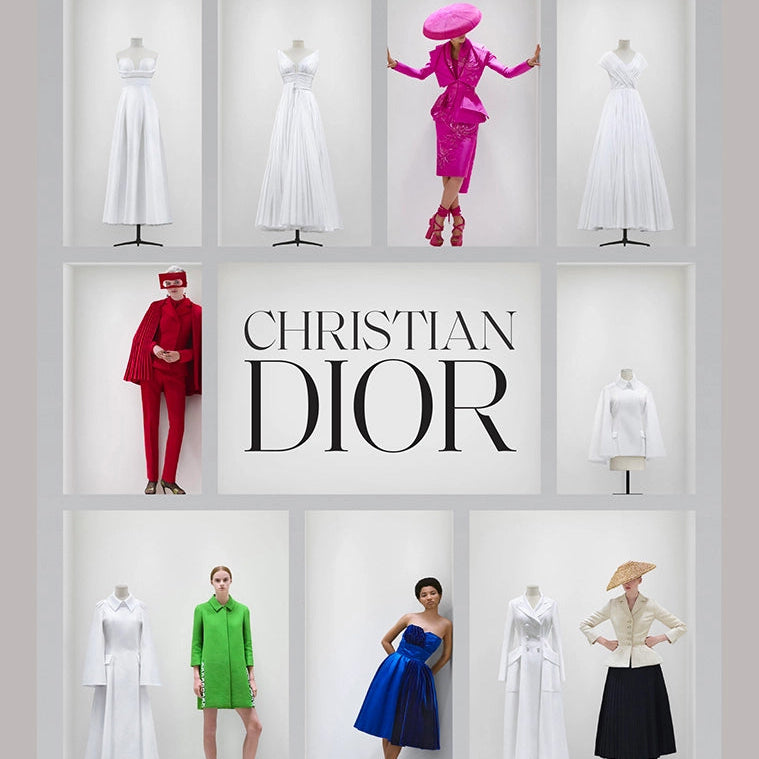 Display of Christian Dior fashion with mannequins wearing various outfits.