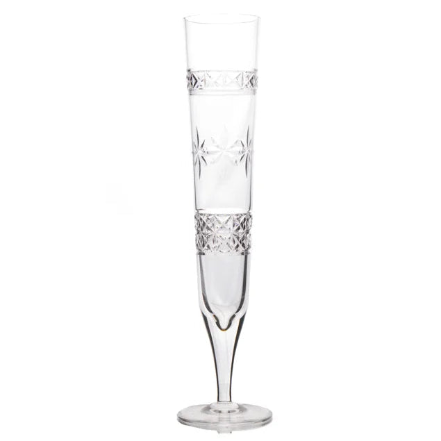 A clear crystal glass flute with geometric patterns etched into the glass.