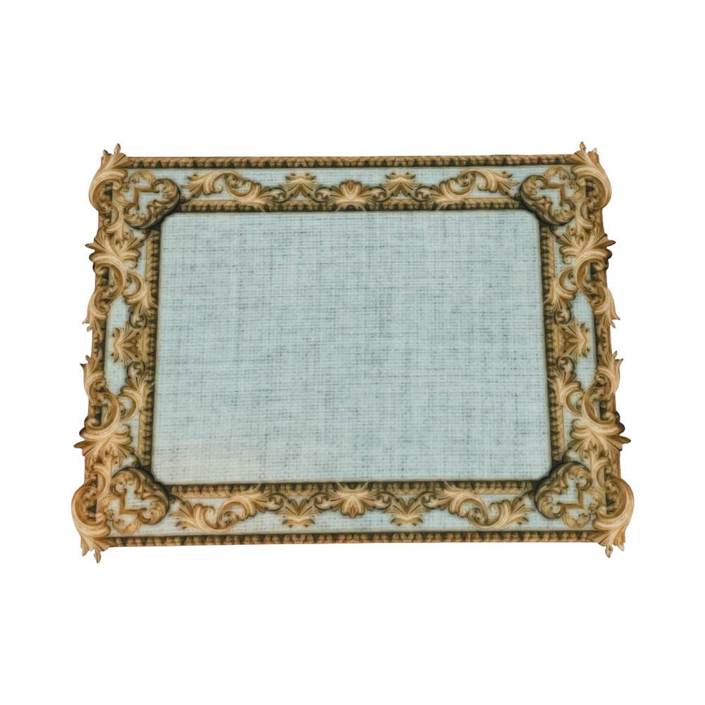 Decorative gold frame with intricate designs.