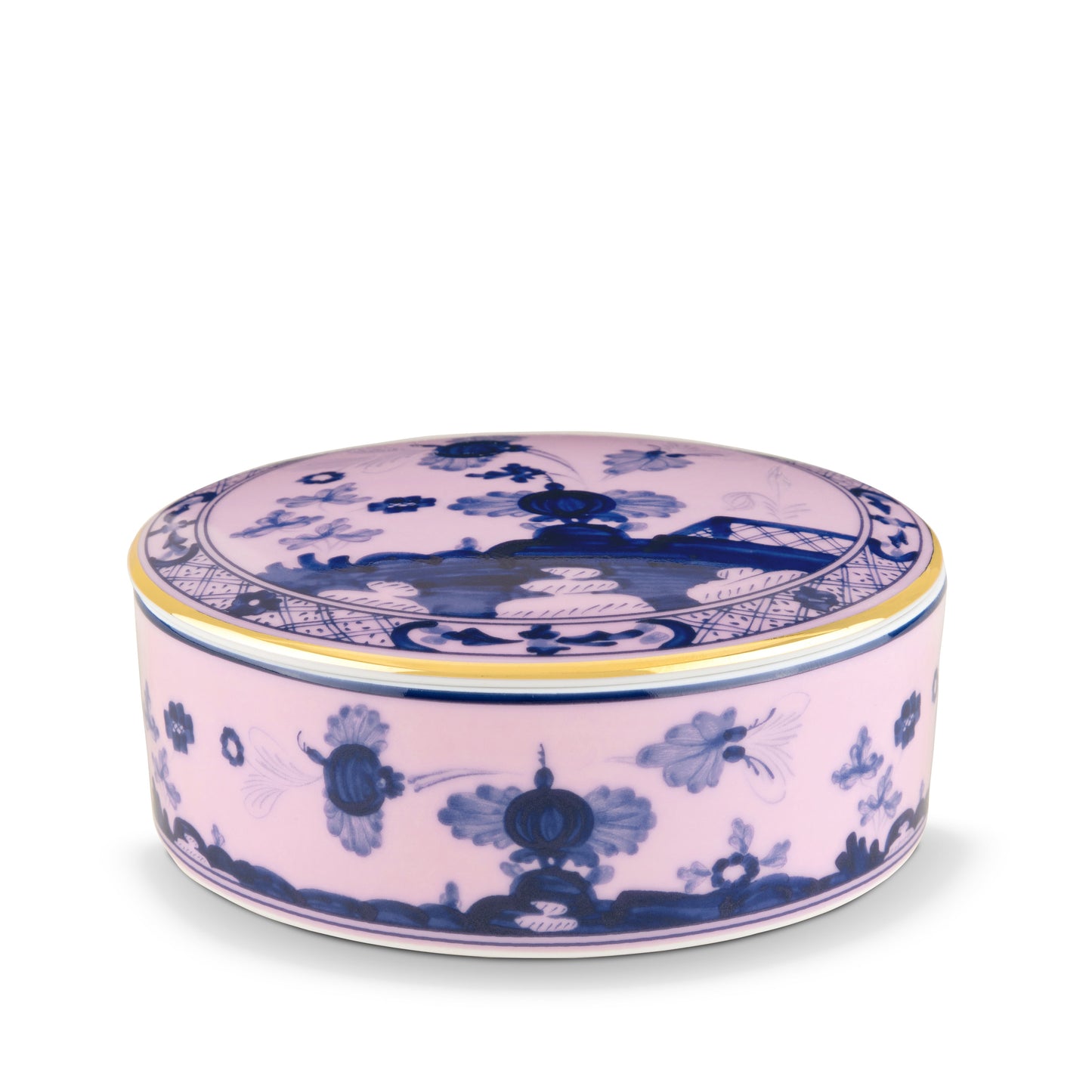A round porcelain trinket box with an azalea pink pattern and gold finished details.