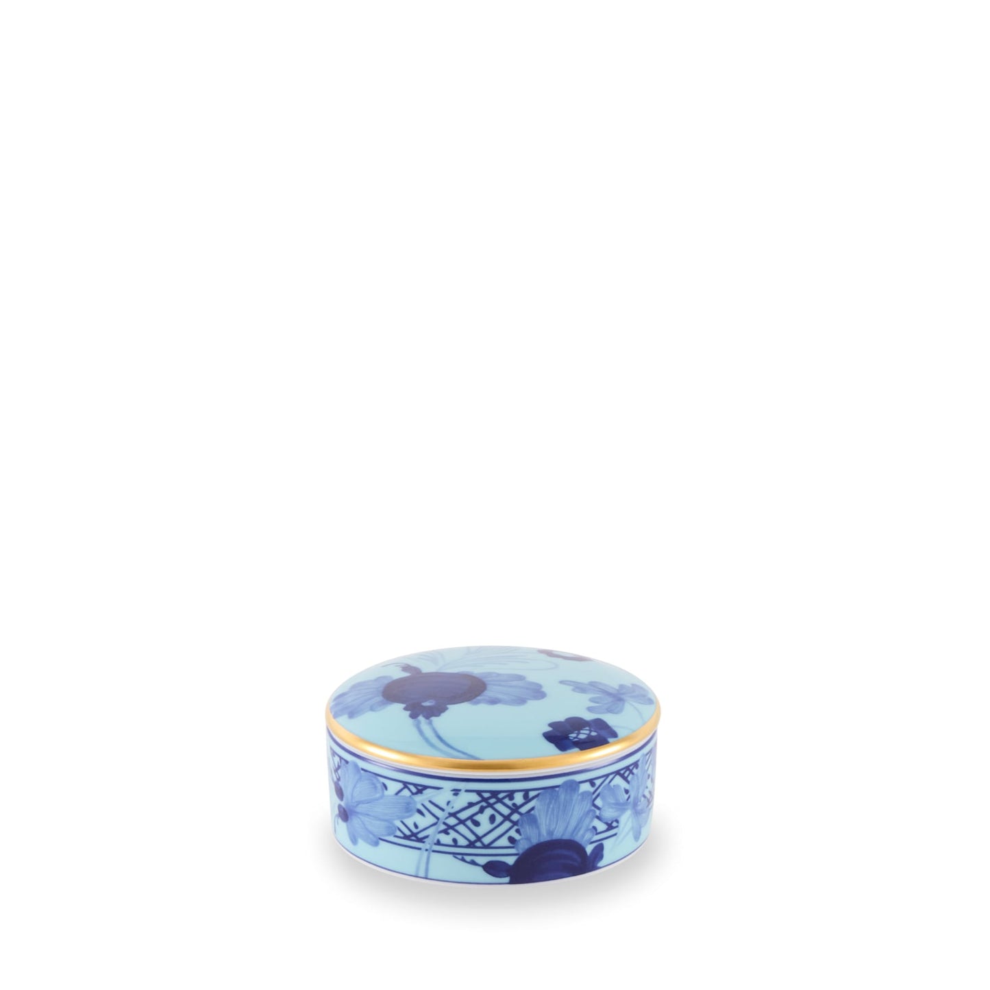 A round, blue porcelain jewelry box with gold trim and floral decorations, from the Oriente Italiano Collection.