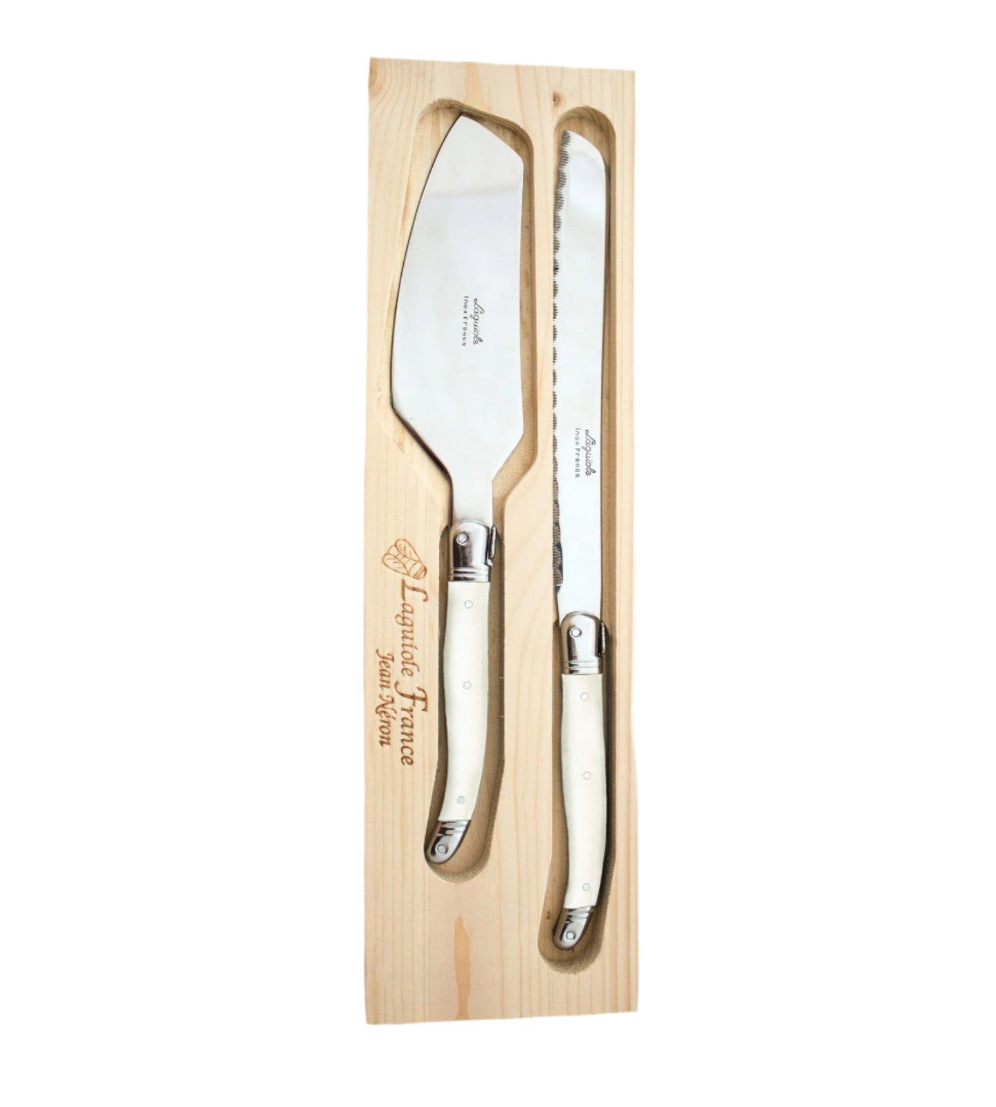 A stainless steel bread knife and cake server set with ivory handles, placed in a wooden tray with a fitted acrylic lid.