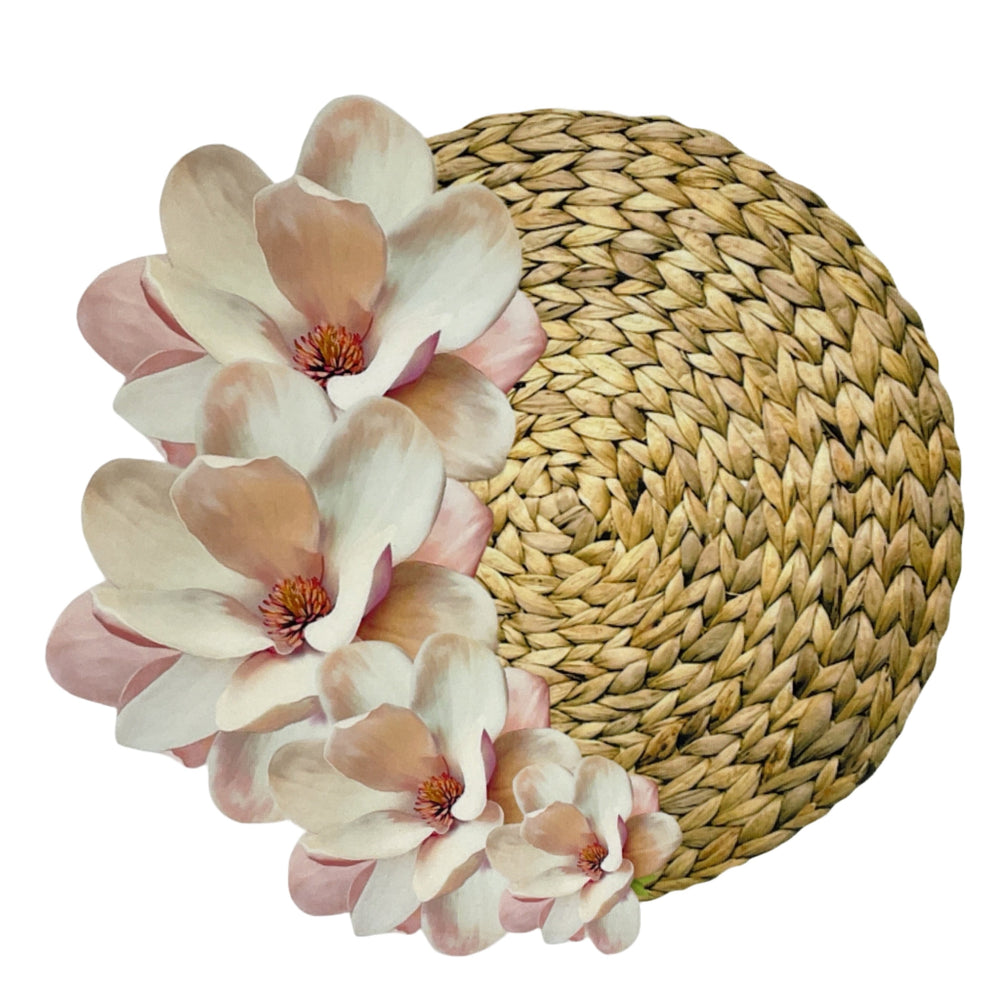 Woven basket with pink and white flowers.