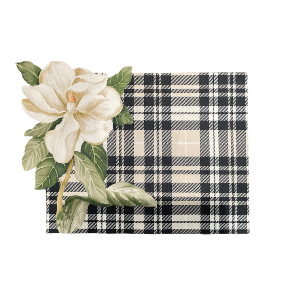 Plaid napkin with a white flower design on a textured gray background