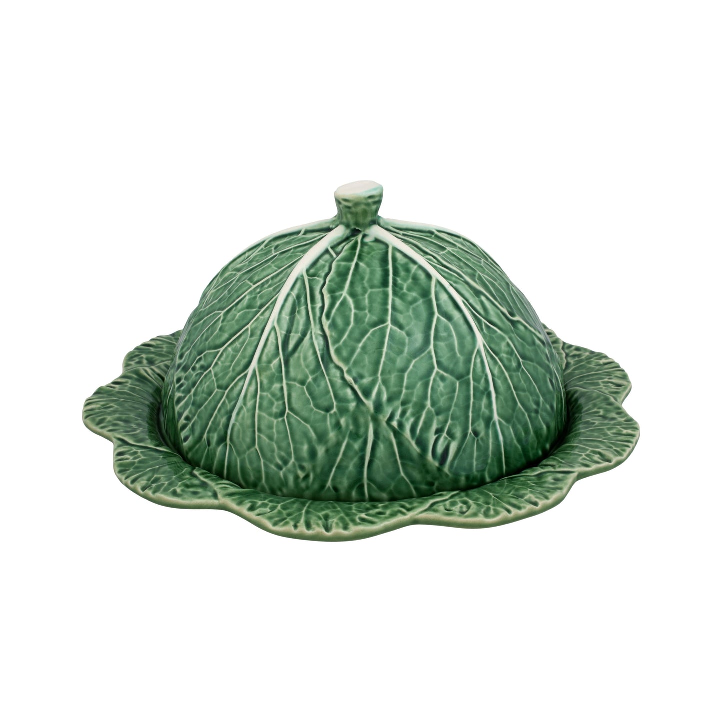 A green ceramic cheese tray designed to resemble a cabbage leaf with a dome-shaped lid, part of the Bordallo Pinheiro Cabbage Collection.