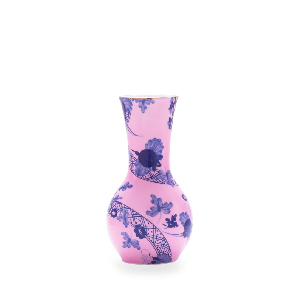 A small, pink, floral-patterned tulip-shaped vase with gold trim.
