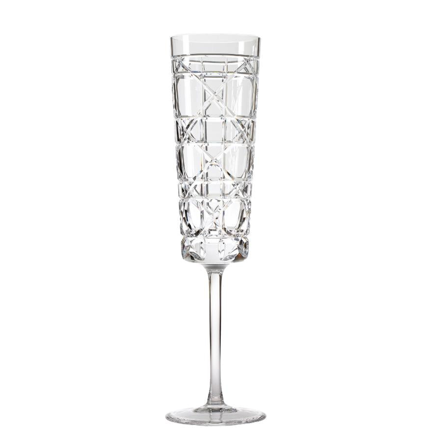 A clear crystal champagne glass with a geometric pattern.