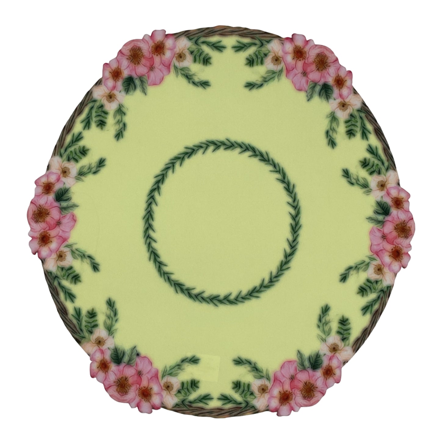 Decorative plate with floral design on a plain background