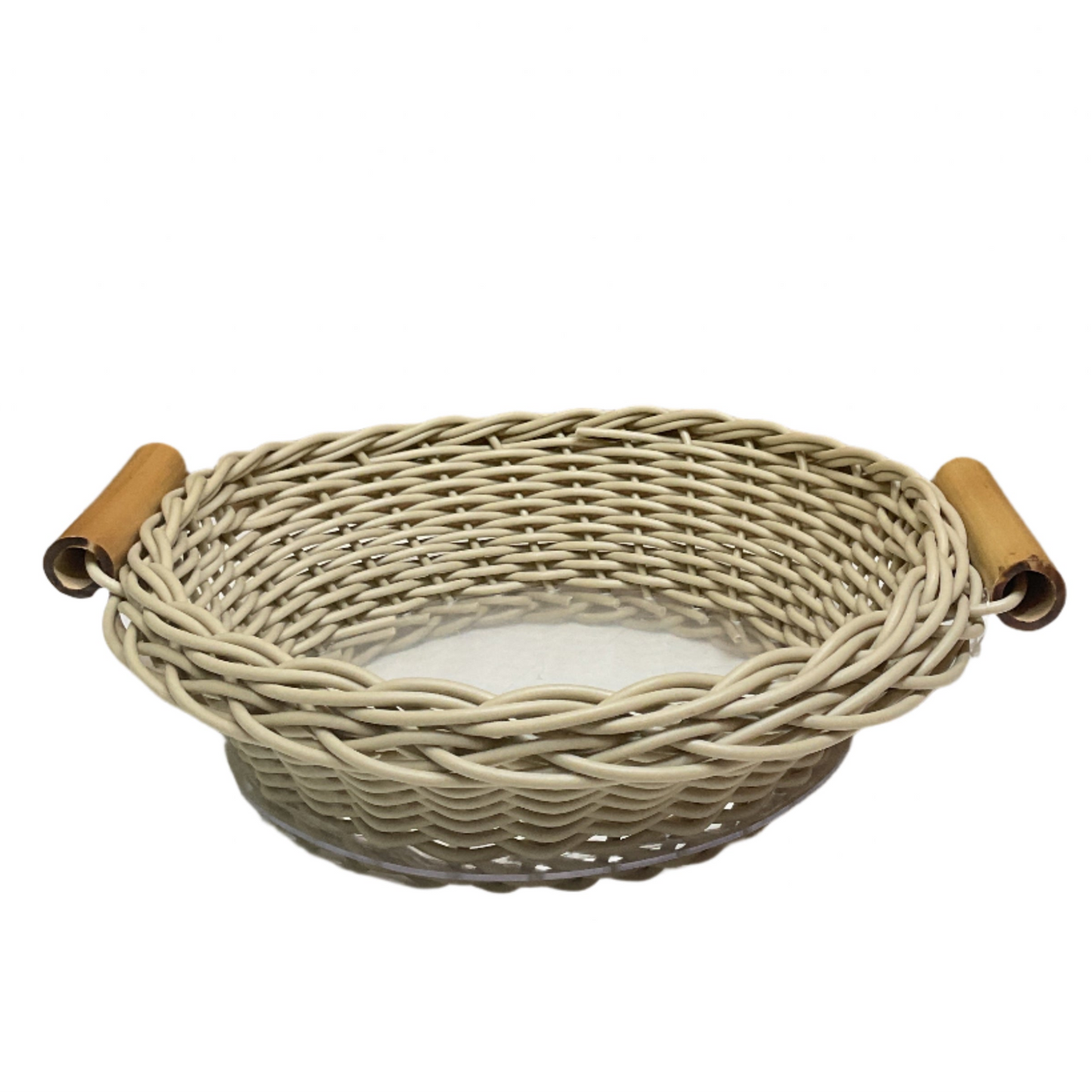 A round beige wicker basket with bamboo handles.