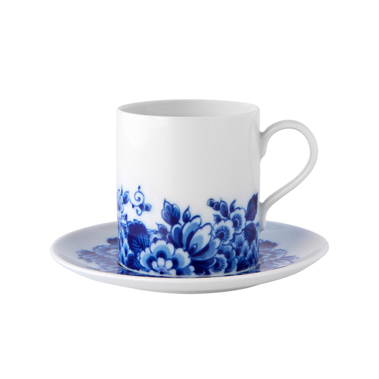 A white ceramic tea cup with blue floral patterns on it, accompanied by a matching saucer, part of the Vista Alegre Blue Ming collection.