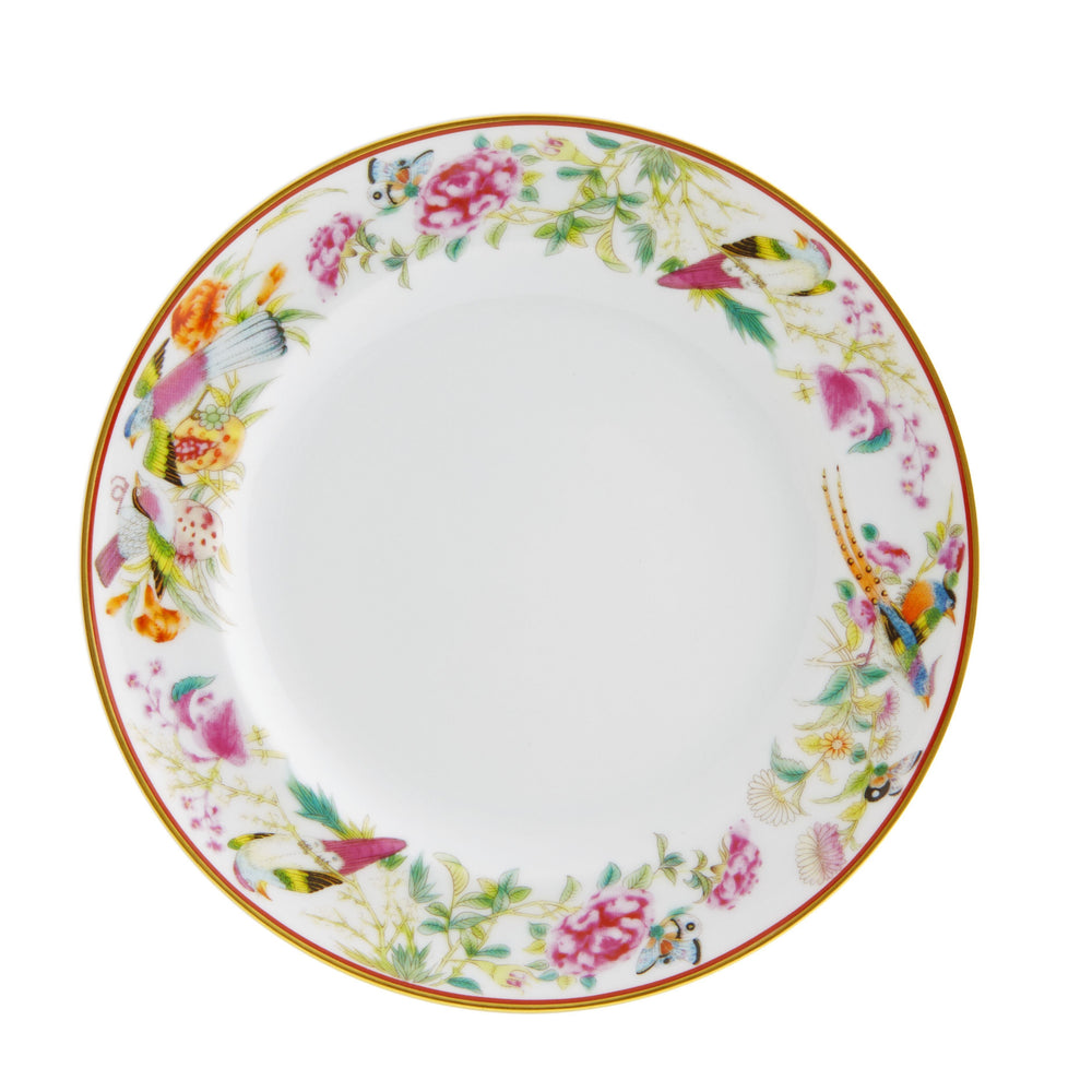 A white ceramic bread and butter plate with gold trim and hand-painted floral patterns.