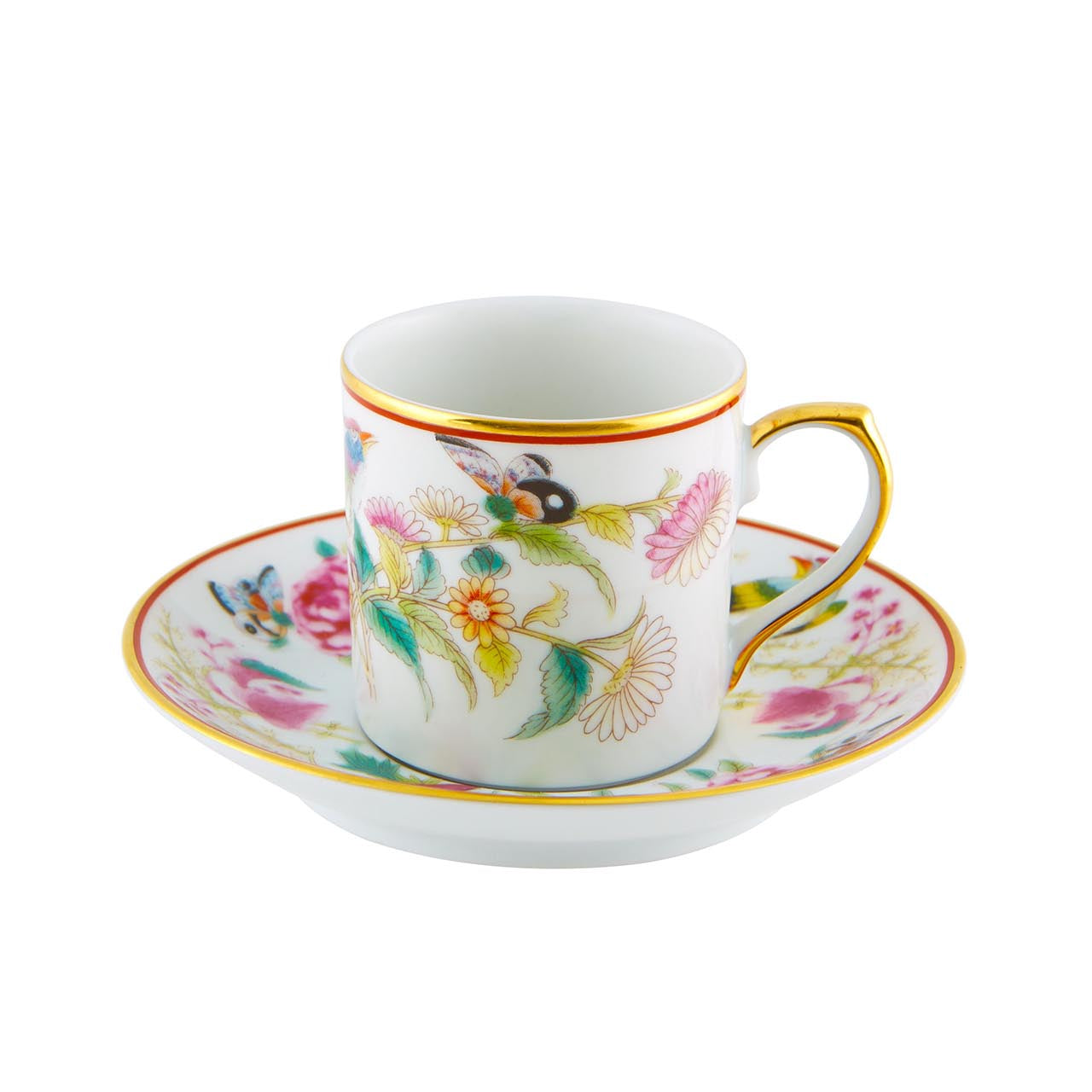 A Vista Alegre Paco Real coffee cup with saucer, featuring colorful floral patterns and gold accents.
