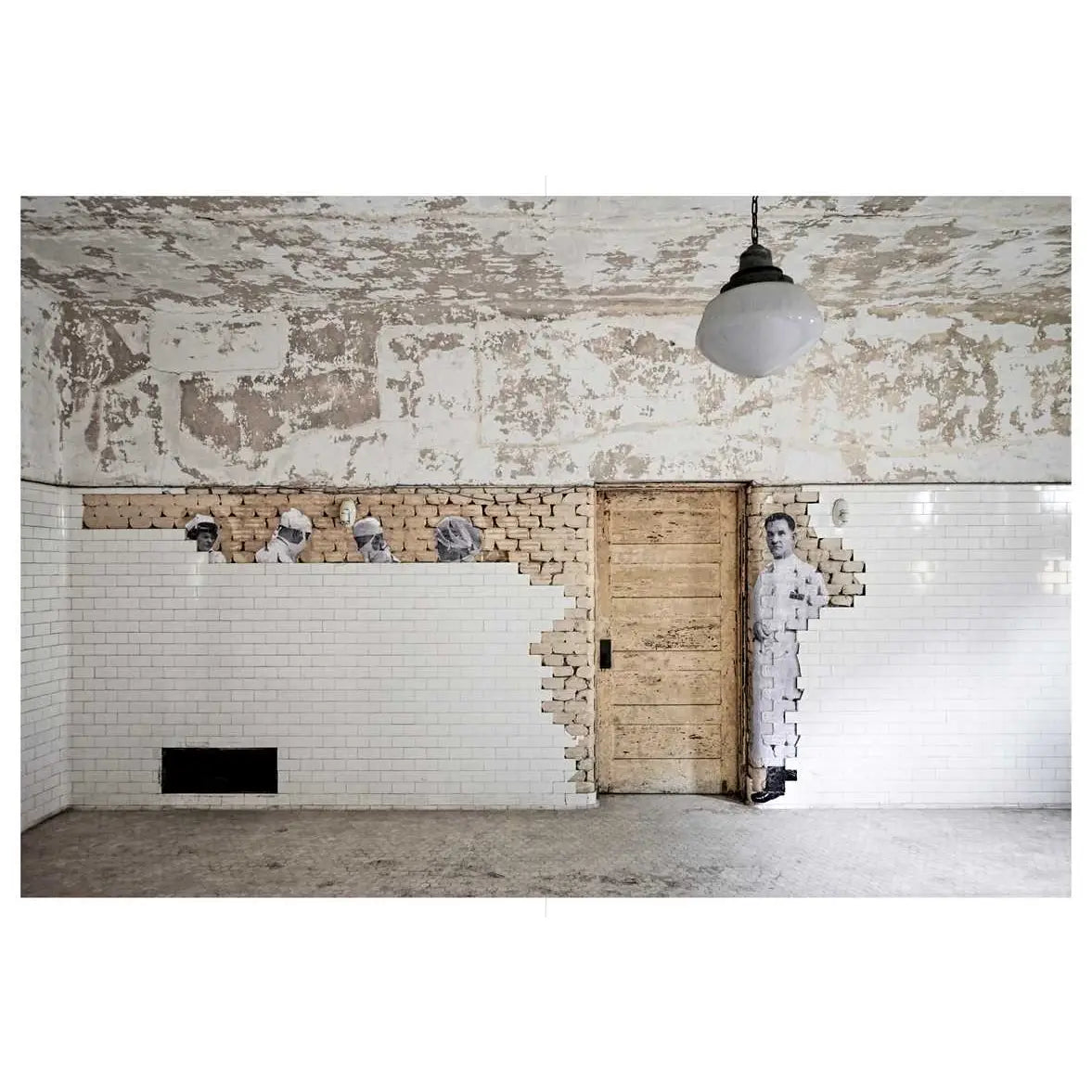 Modern interior design with a textured wall, brick accents, and a wooden door.